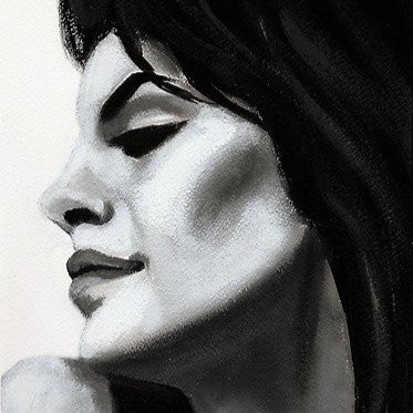 Charcoal portrait of a woman in profile, rendered in dramatic black and white with expressive shading; her closed eyes and parted lips evoke quiet intensity, while flowing dark hair frames her face in soft contrast.