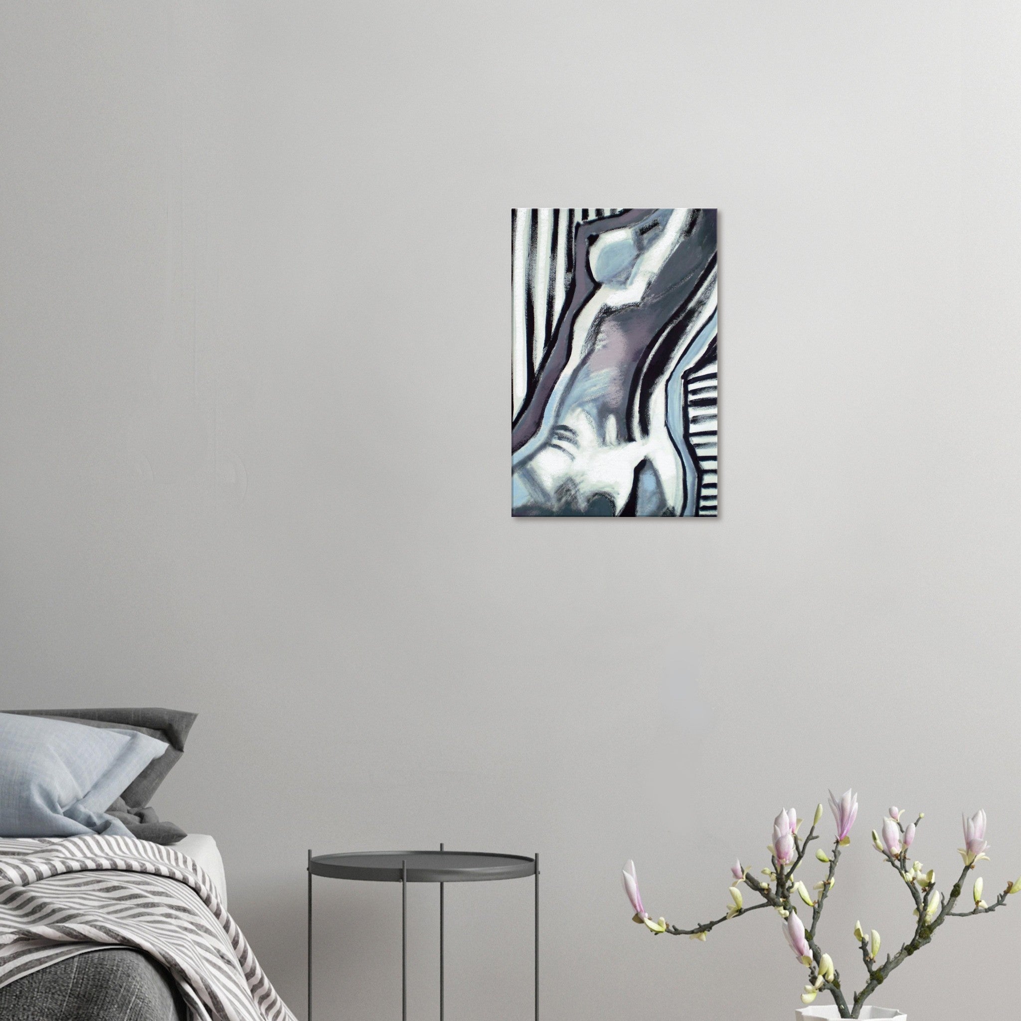 Abstract painting of a human torso in blue and gray tones on a white wall in a modern bedroom