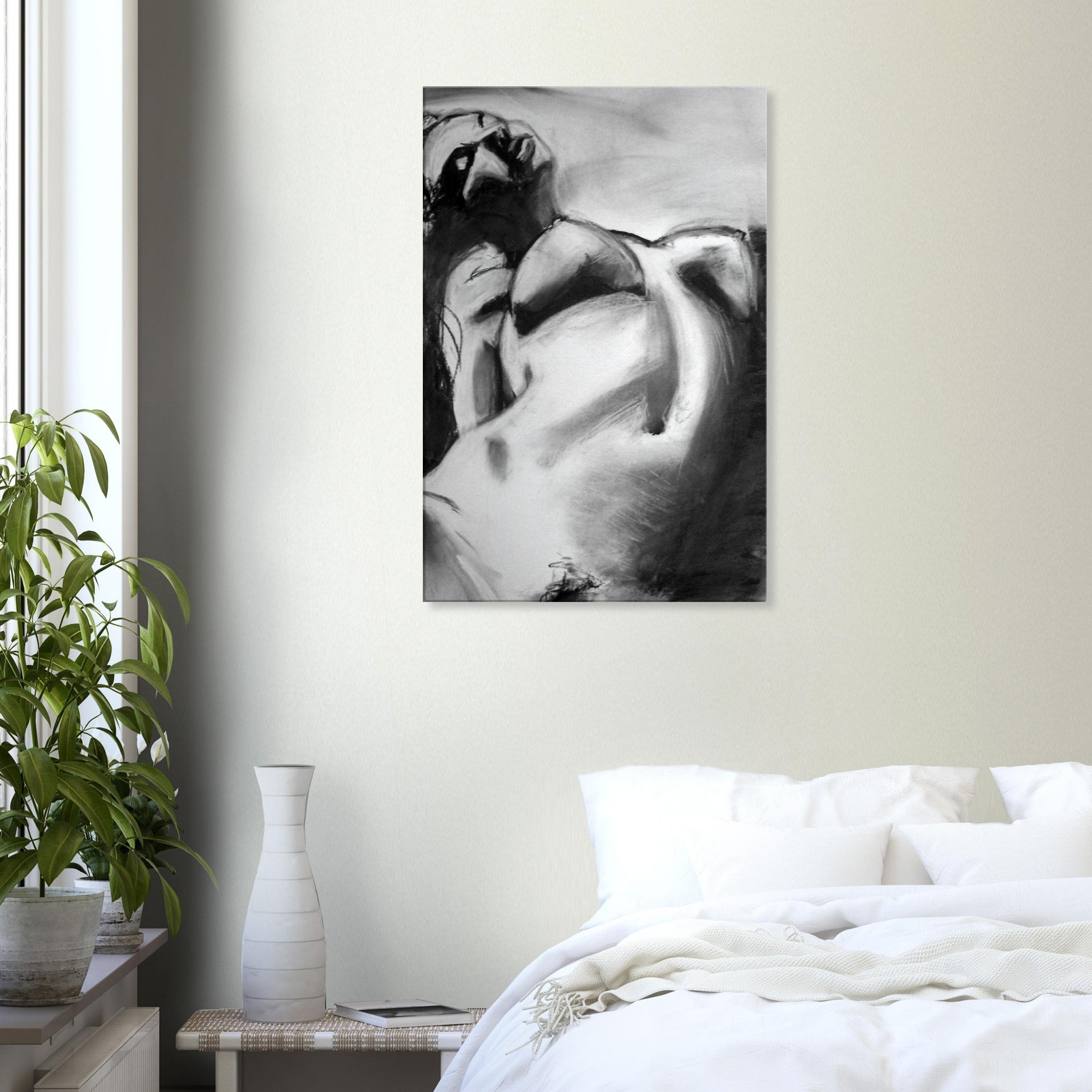 Black and white abstract charcoal painting of a reclining nude figure hanging above bed in minimal bedroom