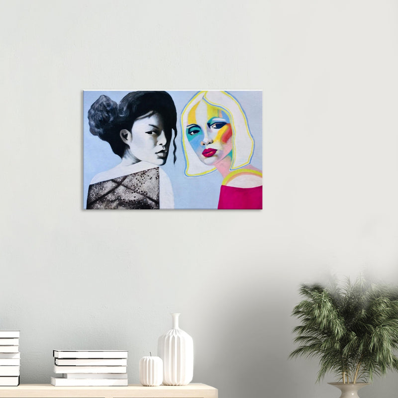 Modern wall art painting of two women's faces in black and white and colorful style in minimalist room