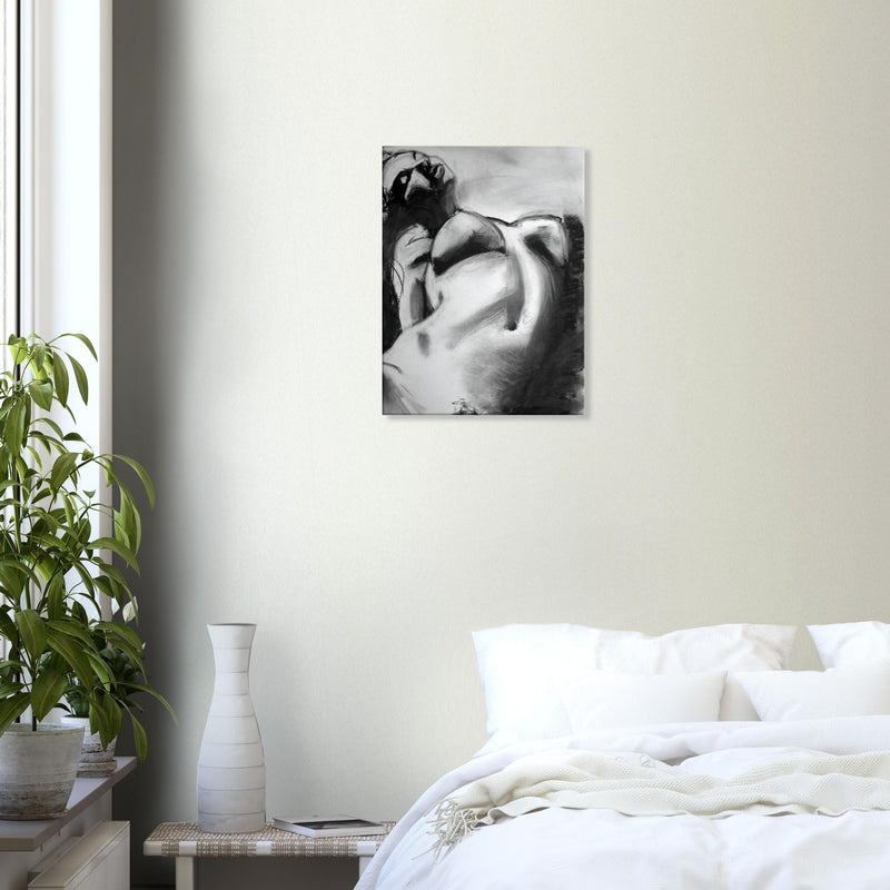 Black and white abstract painting of a reclining nude woman on bedroom wall above bed with white linens