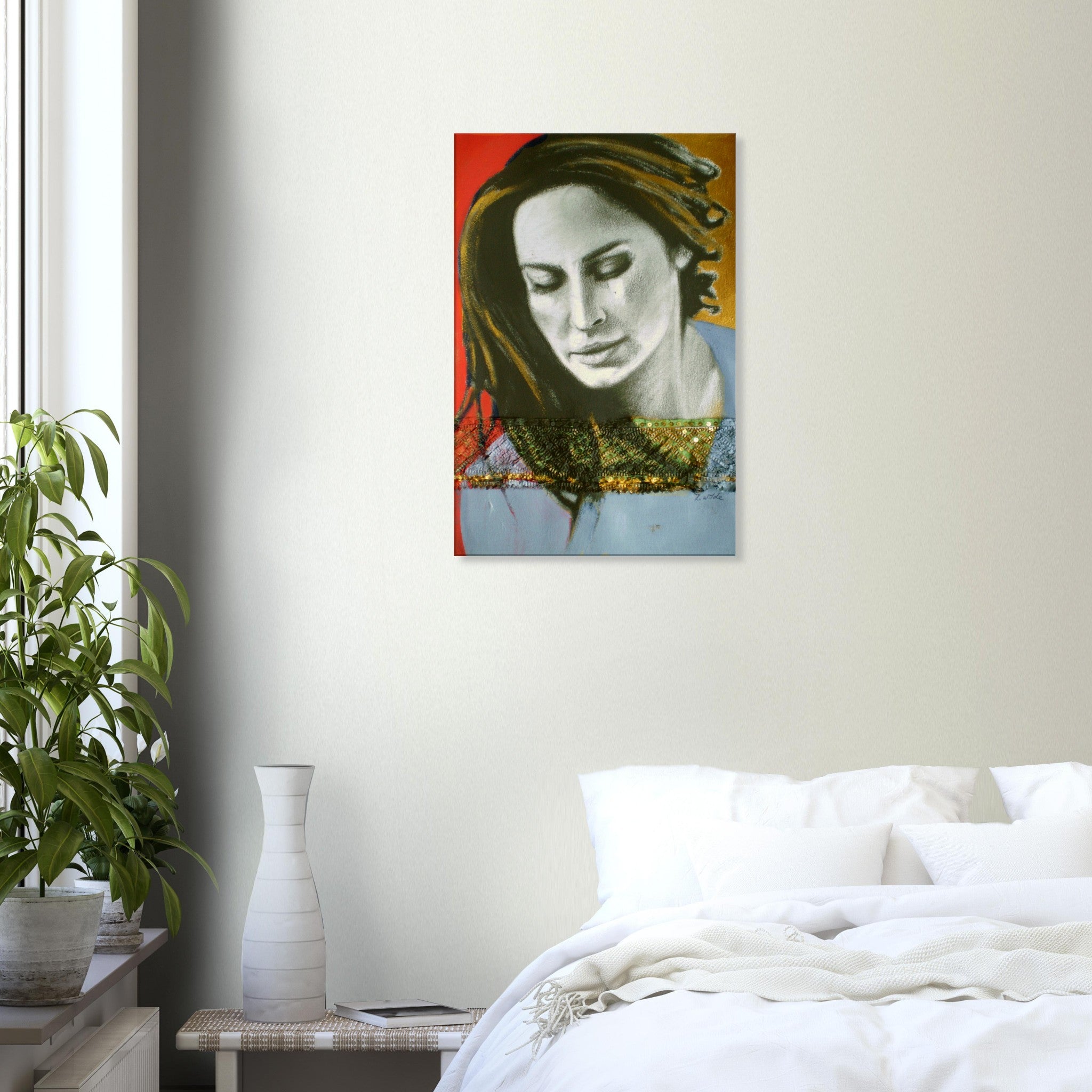 Modern bedroom with white bedding and wall art of a woman's portrait with red and orange background