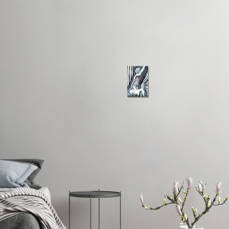 Minimalist bedroom with abstract nude art painting on gray wall and modern side table